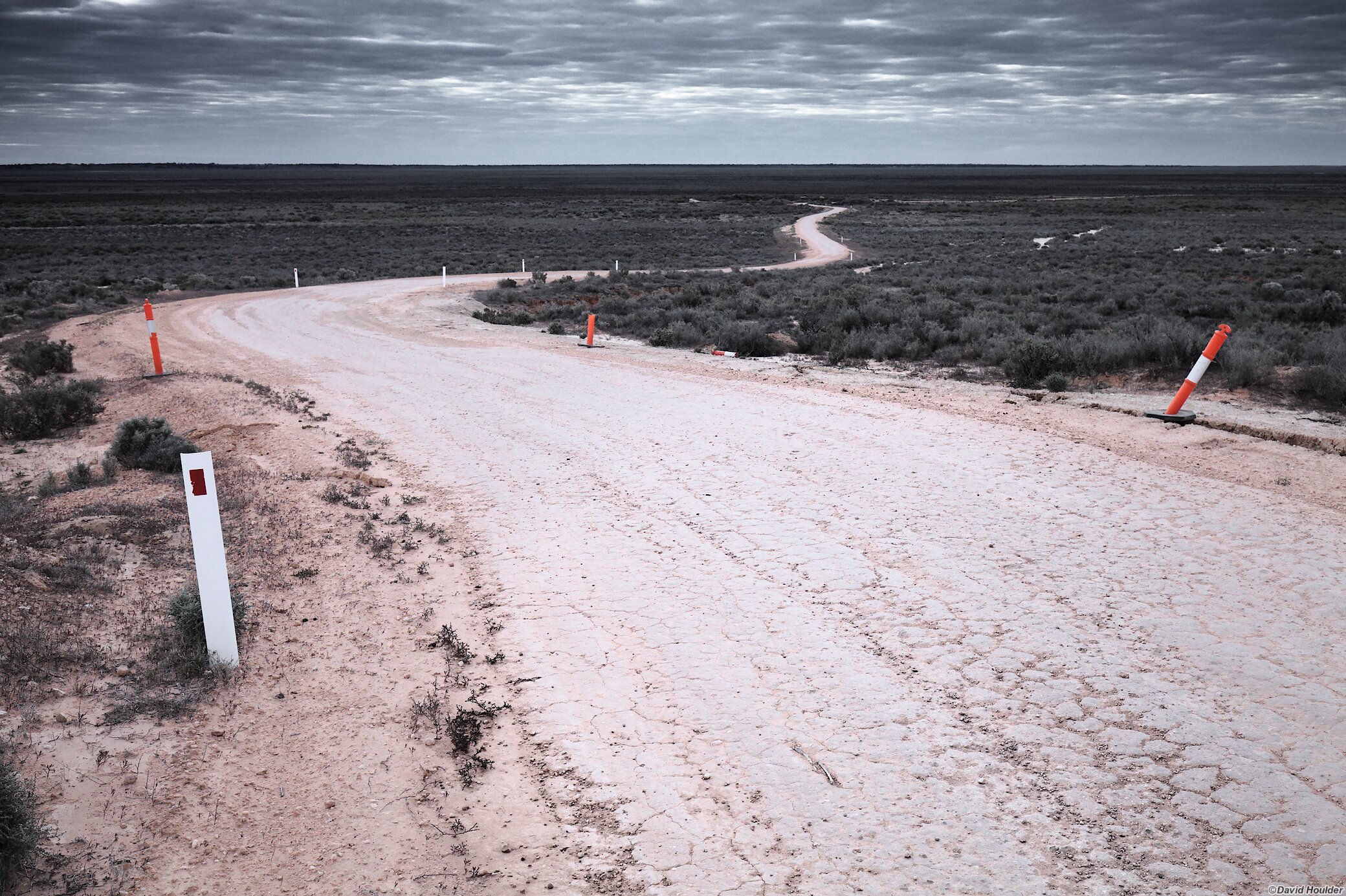 Winding dirt road disappearing into the distance